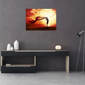 Obraz - Sylwetka kobiety o zachodzie słońca (70x50 cm)