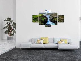 Obraz wodospadu między skałami (125x70 cm)