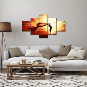 Obraz - Sylwetka kobiety o zachodzie słońca (125x70 cm)