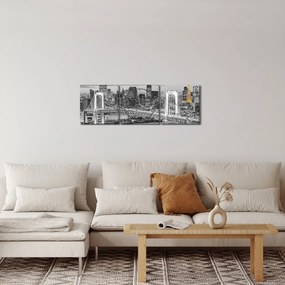 Obraz - Duże miasto z żółtą wieżą (z zegarem) (90x30 cm)