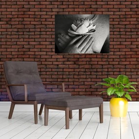 Obraz na szkle - Lotos w rękach Buddy (70x50 cm)