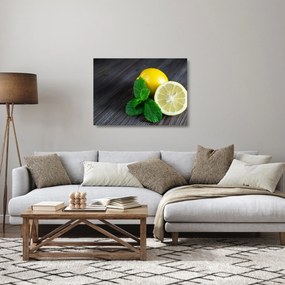 Obraz na szkle - cytryn i mięty na stole (70x50 cm)