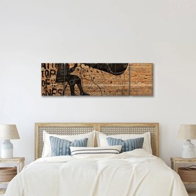 Obraz - Mężczyzna na rowerze w stylu Banksy (170x50 cm)