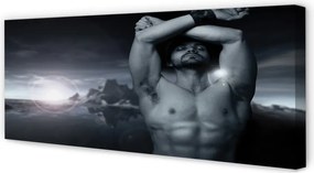 Zdjęcie na płótnie Mężczyzna w Górach