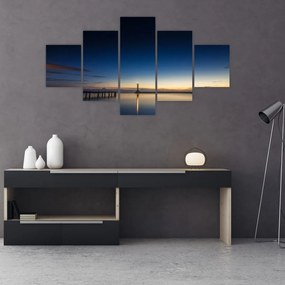 Obraz latarni morskiej w oddali (125x70 cm)