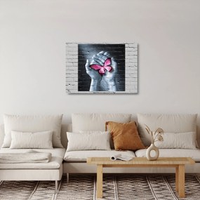 Obraz na szkle - Różowy motyl w ścianie (70x50 cm)