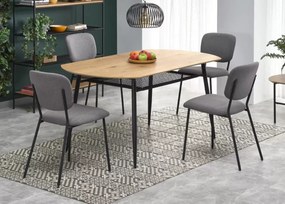 Zaowalony stół Vero 160 x 90 cm z eleganckim blatem w odcieniu złotego dębu i czarnymi nogami oraz półką pod blatem