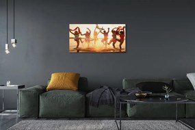 Obraz canvas na ścianę Ludzie nad Morzem o Zachodzie