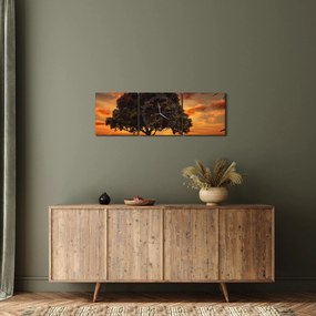 Obraz drzewa o zachodzie słońca (z zegarem) (90x30 cm)
