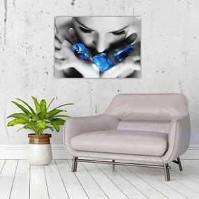 Obraz na szkle portretu kobiety z kamieniami (70x50 cm)