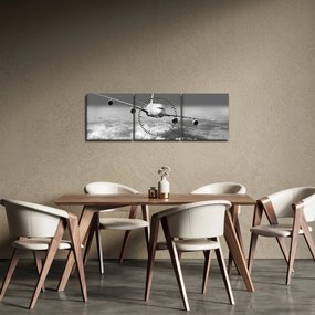 Obraz - Samolot w chmurach, czarno-biały (z zegarem) (90x30 cm)
