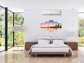 Obraz miasta o zachodzie słońca (125x70 cm)