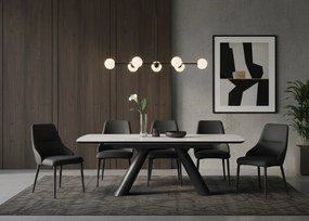 Elegancki stół z białym ceramicznym blatem na hartowanym szkle. Metalowa podstawa z czarnej stali nadaje mu nowoczesny charakter i wyjątkową trwałość.