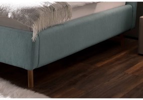 Jasnoniebieske tapicerowane łóżko dwuosobowe ze schowkiem i stelażem 160x200 cm Lotte – Meise Möbel