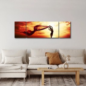 Obraz - Sylwetka kobiety o zachodzie słońca (170x50 cm)