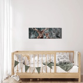 Obraz - Jeleń i łania w zaśnieżonym lesie (z zegarem) (90x30 cm)