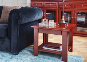 Elegancki stolik kawowy Classico, fornirowany, odcień koniaku. Dodatkowa półka pod blatem. Wymiary stolika 60x60x49 cm. Stolik ma ładnie wyprofilowany na krawędziach blat. Pasuje do mebli gabinetowych Prestige.