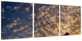 Obraz - palmy pośród chmur (z zegarem) (90x30 cm)