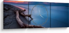 Obraz plaży o zachodzie słońca (z zegarem) (90x30 cm)