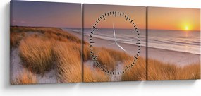 Obraz - Plaża o zachodzie słońca (z zegarem) (90x30 cm)