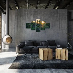 Obraz słońca przeświecającego przez gałęzie drzew (125x70 cm)