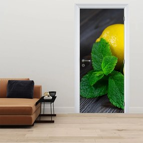 Fototapeta na drzwi - Cytryna i mięta na stole (95x205cm)