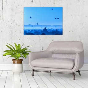 Obraz na szkle - Balony nad krajobrazem (70x50 cm)