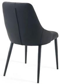 Eleganckie czarne krzesło Monolit tapicerowane ekoskórą PU, wygodne, nowoczesne i idealne do jadalni lub biura. Smukłe metalowe nogi dodają mu lekkości i stylu.
