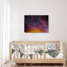 Obraz na szkle - rozmyte gwiazdy na niebie (70x50 cm)