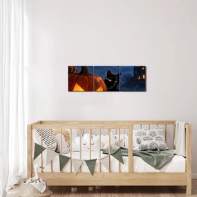 Obraz - Czarny kot przy świecącej dyni na Halloween (z zegarem) (90x30 cm)