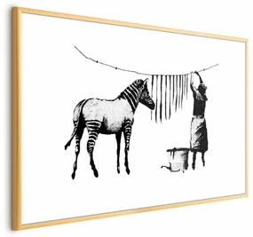 Plakat Banksy: Pranie 60x40 cm z ramą złotą z marginesem ARTGEIST B