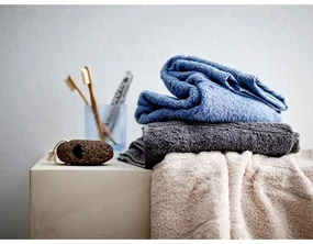 Niebieski bawełniany ręcznik frotte 50x100 cm Line – Södahl