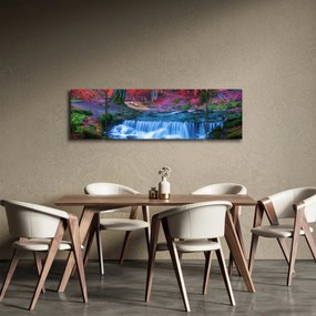 Obraz wodospadu w czerwonym lesie (170x50 cm)