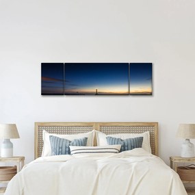 Obraz latarni morskiej w oddali (170x50 cm)