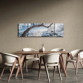 Obraz ośnieżonego drzewa nad wodą (170x50 cm)