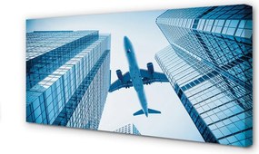 Obraz na płótnie Samolot nad Dachami Miasta