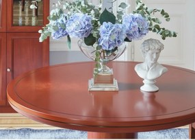 Elegancki stół biurowy o okrągłym blacie Conference. Dwa rozmiary średnicy do wyboru: 90 cm i 120 cm. Stół fornirowany drewnem w odcieniu koniaku, okrągła podstawa, stylowe wykończenie.