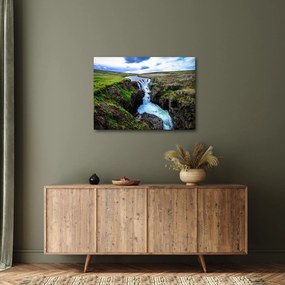 Obraz wodospadu między skałami (70x50 cm)