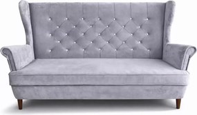 Nowoczesna sofa uszak z przeszyciami i pikowaniem po całości
