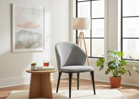 Stylowe krzesło Siena tapicerowane miękką tkaniną w odcieniu szarości. Miękkie siedzisko, zaokrąglone oparcie i metalowe nogi łączą nowoczesny wygląd z wyjątkowym komfortem.