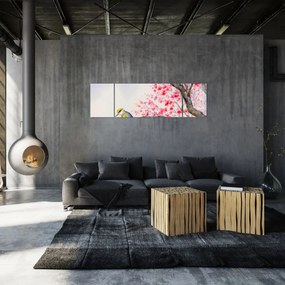 Obraz - ptak na drzewie z czerwonymi kwiatami (170x50 cm)