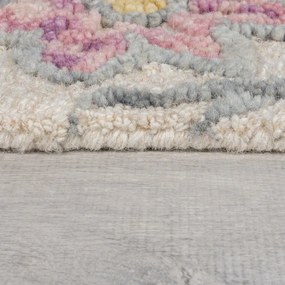 Kremowy wełniany dywan tkany ręcznie 120x170 cm Tania Floral – Flair Rugs