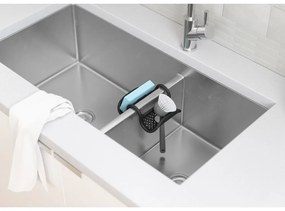 Wiszący plastikowy uchwyt na gąbkę Sling – Umbra