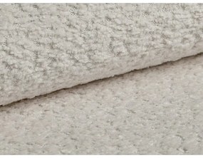 Beżowa rozkładana sofa z materiału bouclé 206 cm Kemi – Cosmopolitan Design