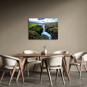 Obraz wodospadu między skałami (70x50 cm)