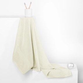 Kremowy bawełniany ręcznik frotte 30x50 cm Marina – DecoKing