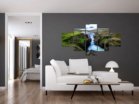 Obraz wodospadu między skałami (125x70 cm)