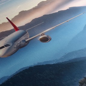 Obraz - Samolot nad szczytami gór (70x50 cm)