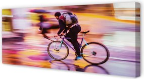 Obraz canvas na ścianę Rowerzysta w Blasku Świateł