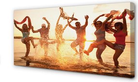 Obraz canvas na ścianę Ludzie nad Morzem o Zachodzie